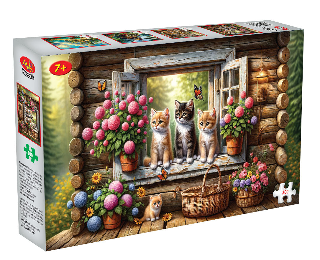 Котенца на прозорец